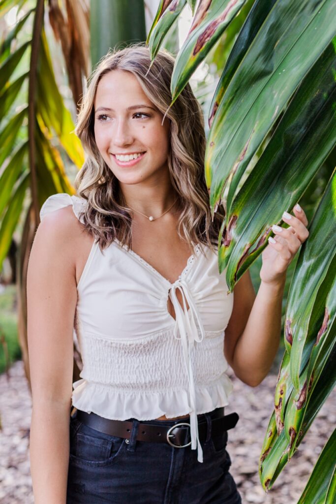 Riley Palm Frond | Senior Portraits in Downtown St.Petersburg, Florida captured by Amanda Dawn Photography