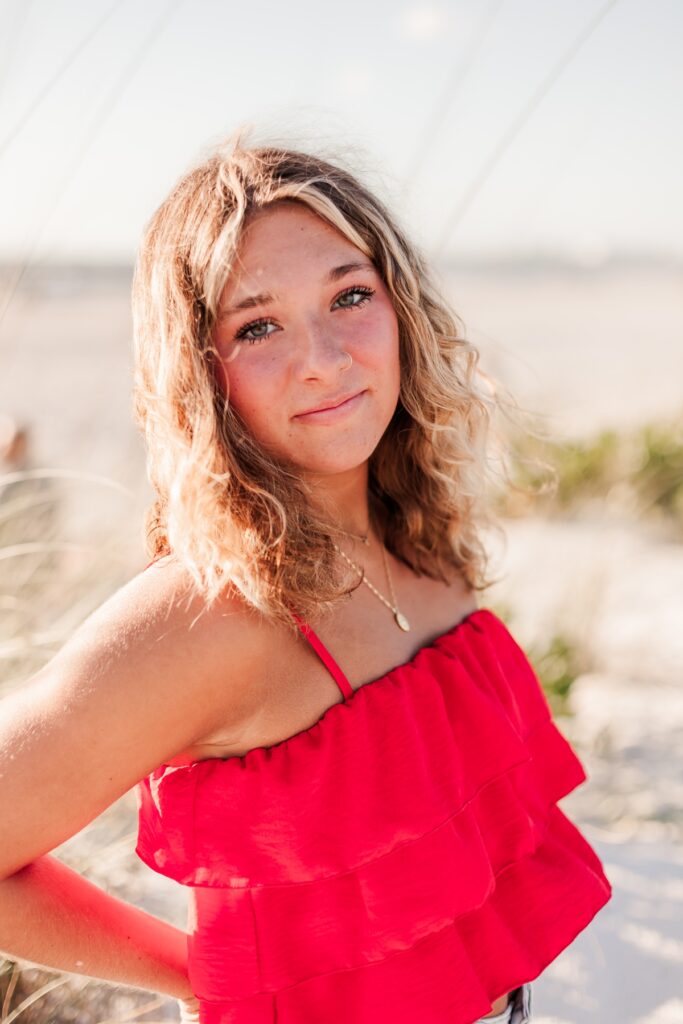 Senior girl in bright top at St. Petersburg Beach.