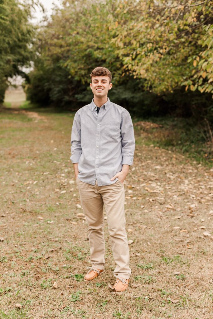 A happy male graduate in casual clothes. 